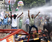 India police clash with protestors over jobs and exam transparency