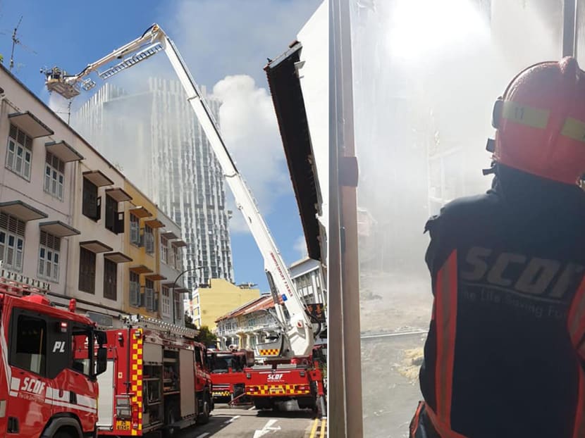 A fire was raging in the morning of June 15, 2021 at a shophouse located at 31 Teo Hong Road, off New Bridge Road.