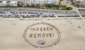 Thousands of protesters rally against Trump across US