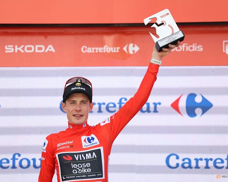 Cycing-Vingegaard celebrates Vuelta win in car park, atop drinks cooler