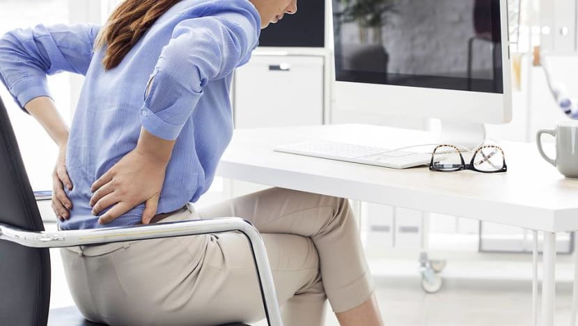 Commentary: More people are in pain – from sitting at their desks all day Commentary: More people are in pain – from sitting at their desks all day