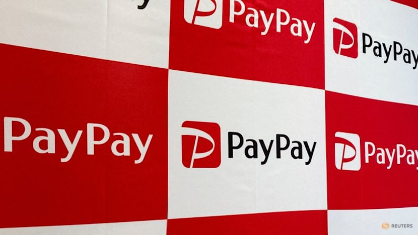 Exclusive-SoftBank's PayPay prices IPO below range at $16 a share