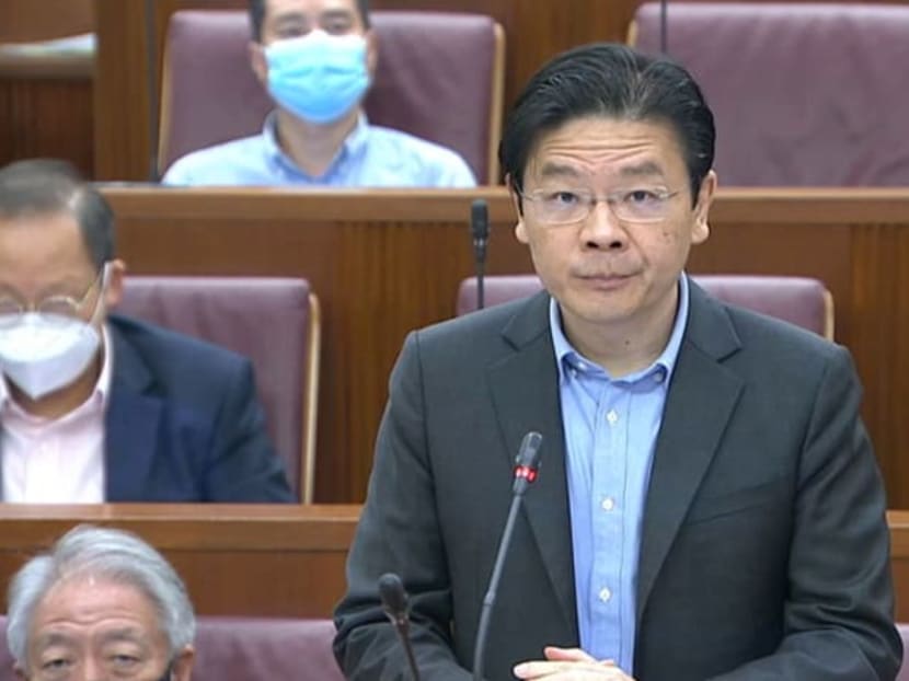 Finance Minister Lawrence Wong speaking in Parliament on Sept 14, 2021.