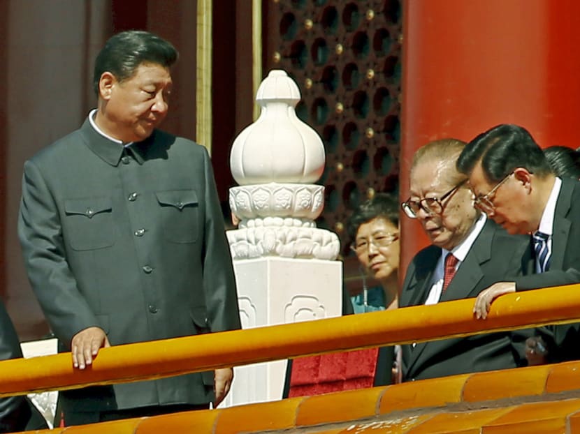 Chinese President Xi Jinping (left) with former presidents Jiang Zemin (second from right) and Hu Jintao. Mr Xi is seeking to prevent Mr Jiang and members of his clique from interfering with appointments, said an analyst. Photo: Reuters