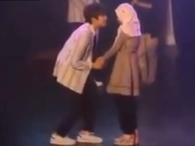 Concerts and stage shows in Malaysia have come under scrutiny recently after a three-minute online video showed tudung-clad Muslim fans being hugged and kissed by K-pop artistes B14A at a mini-concert at the Life Centre in Jalan Sultan Ismail, Kuala Lumpur. Photo: Screengrab from YouTube