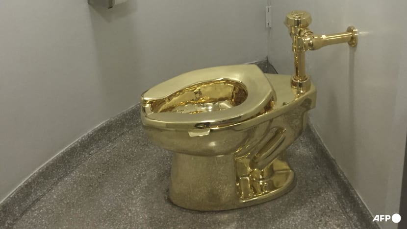 UK court finds two men guilty over gold toilet theft