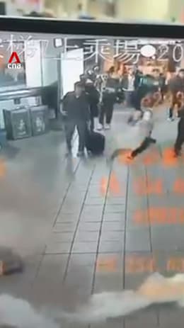 CCTV shows man throwing smoke bombs in Taipei metro station