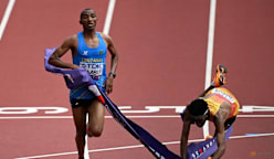 Simbu snatches marathon gold from Petros in historic photo finish