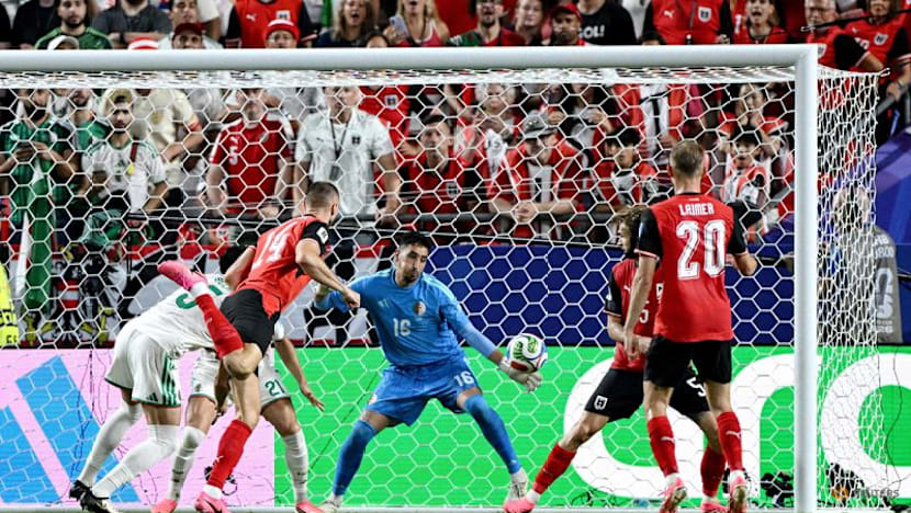 Austria, Algeria defy controversial format to deliver World Cup thriller