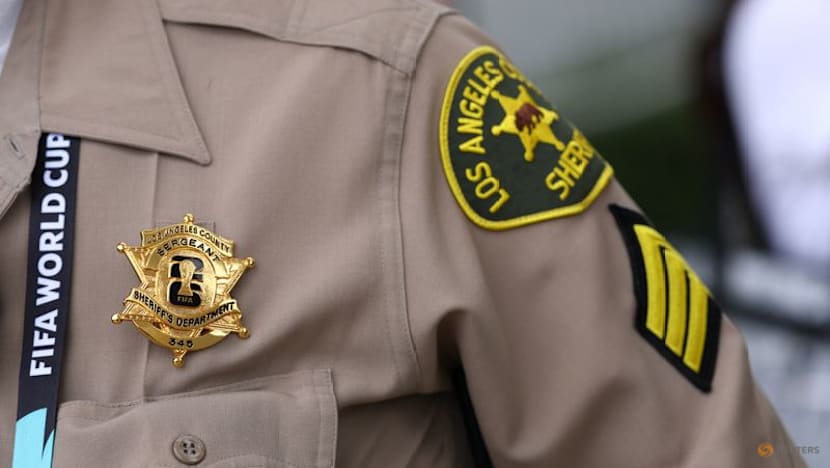 Police, firefighters proudly wear World Cup badges as they provide security