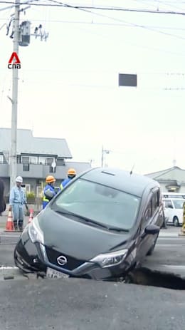 Road caves in after quake in Japan, train services halted