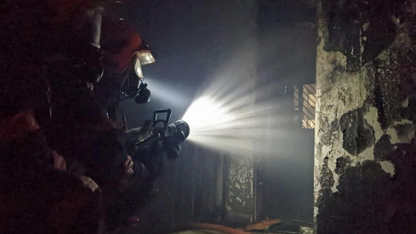 Man charged with causing fire in Tampines flat by dropping lit cigarette on floor