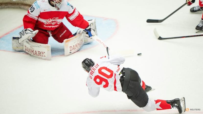 Ice hockey-Denmark stun Canada, Swedes beat Czechs to reach world championship semis
