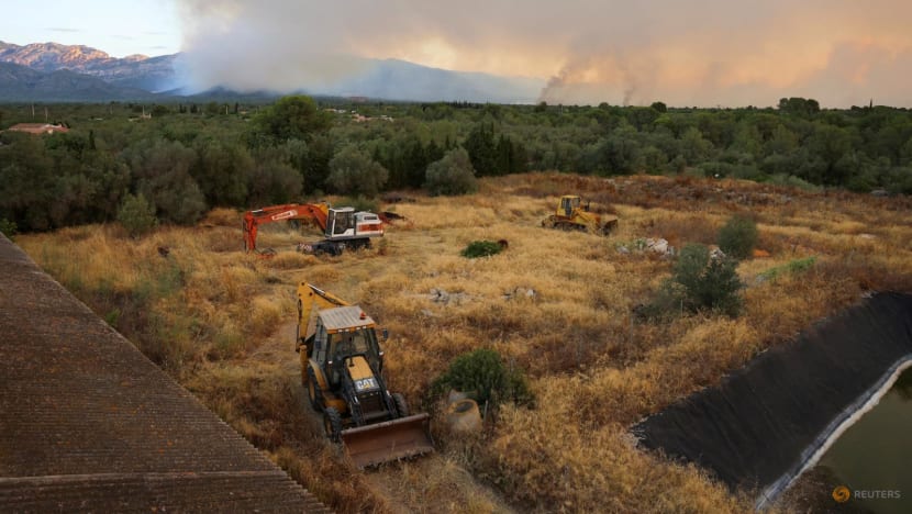 More than 18,000 people in lockdown as wildfire rages in Catalonia More than 18,000 people in lockdown as wildfire rages in Catalonia