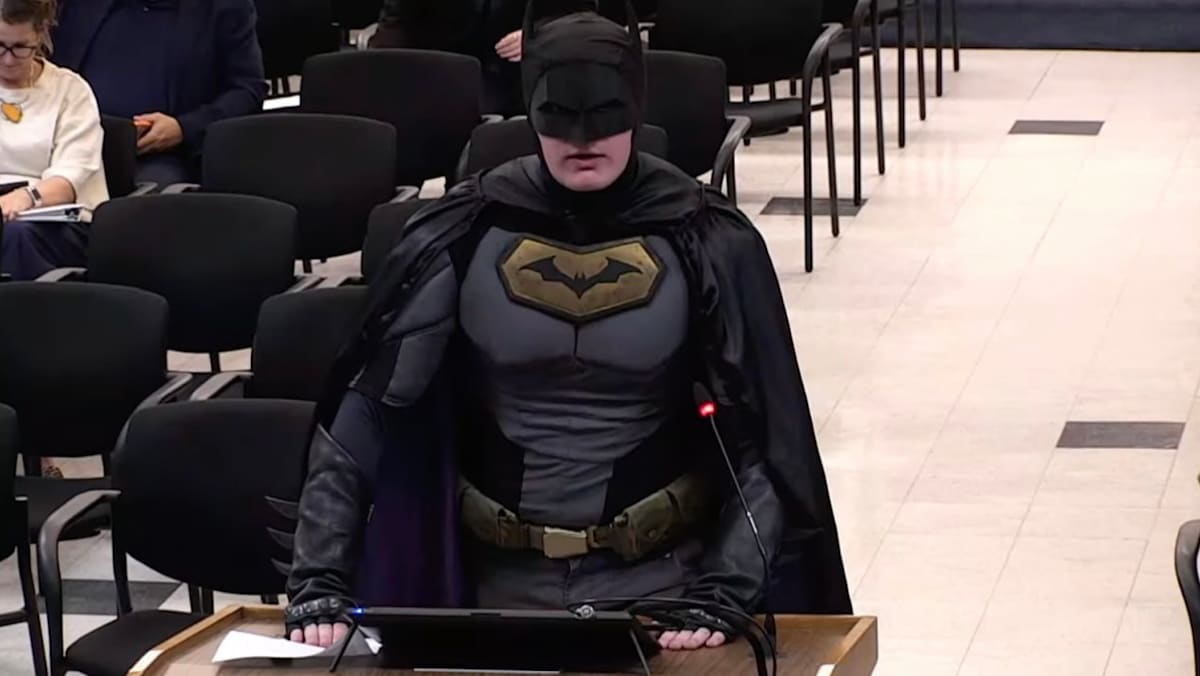 Man dressed as Batman urges city officials in California to block ICE role at upcoming Super Bowl