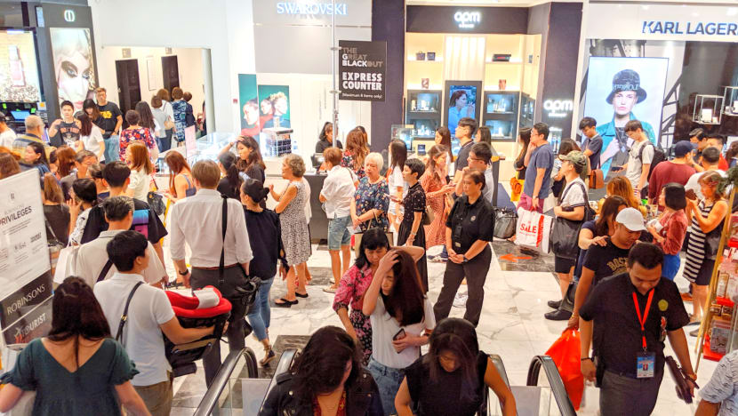 Rain did not deter shoppers who made a beeline for Black Friday discounts on Orchard Road