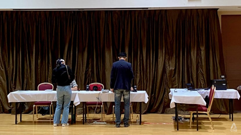 Singaporeans living abroad cast their votes at overseas polling stations and by post Singaporeans living abroad cast their votes at overseas polling stations and by post