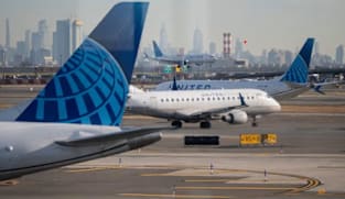 Passenger jet clips lamp-post, truck while landing at Newark