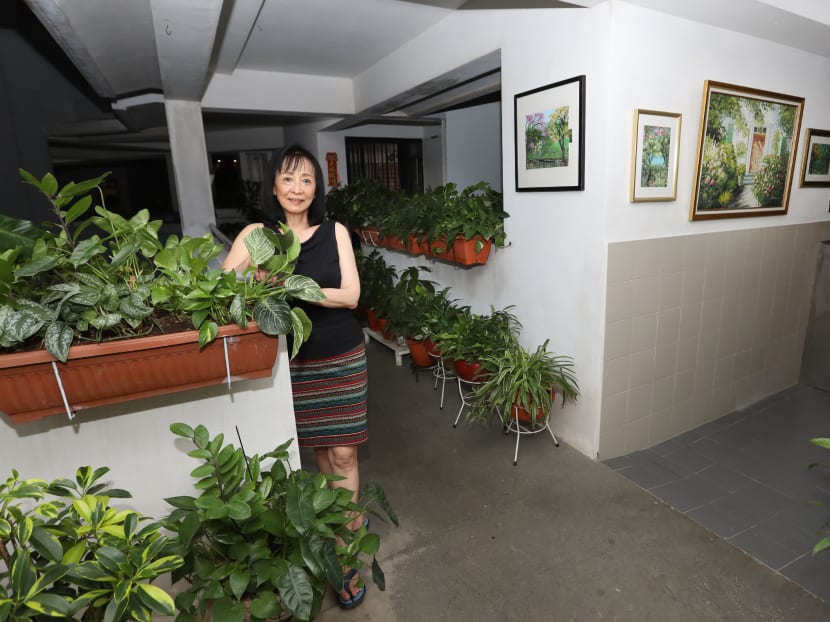 Ms Mary Aw, who lined the corridor outside her Anchorvale Crescent flat with plants and paintings. Ms Mary Aw, who lined the corridor outside her Anchorvale Crescent flat with plants and paintings.