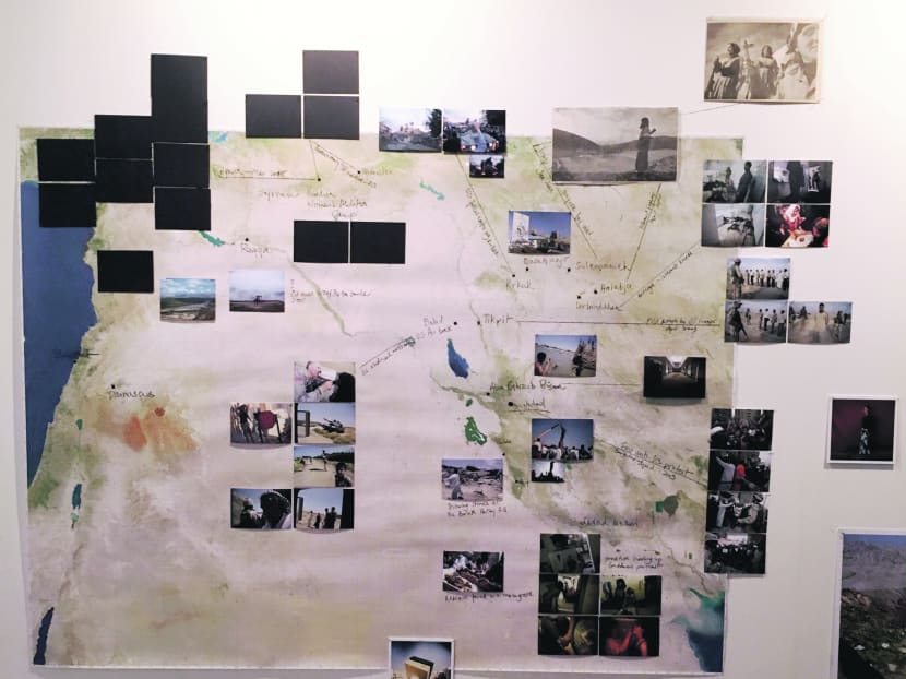 Blacked out photos at Newsha Tavakolian's exhibition at The O.P.E.N launch. Photo: Reena Devi