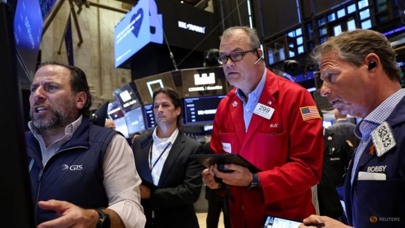 Stocks dip, dollar advances after data, Powell comments