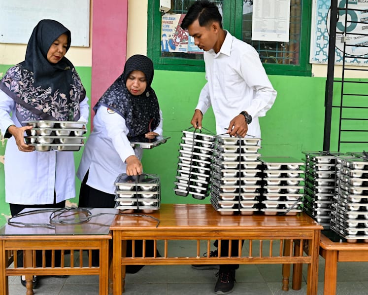 Indonesia free meals agency office locked down as investigators raid premises