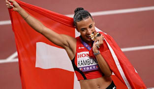 Swiss Kambundji takes shock world 100m hurdles crown