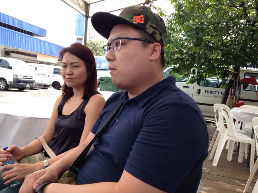 Mr Darius Liew and Ms Ng Khai Hiang speaking to the media at the wake in Sin Ming on Dec 27, 2015. Photo: Angela Teng