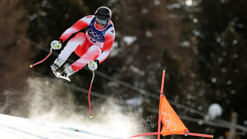 Alpine skiing-Switzerland's Von Allmen wins downhill gold
