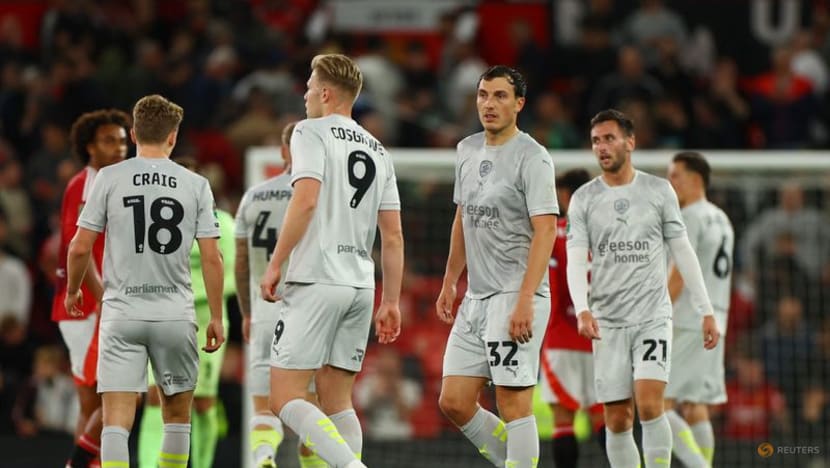 Manchester United put seven goals past Barnsley to progress in League Cup