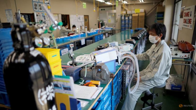 Japan manufacturers stay upbeat on chip demand, services hit by costs