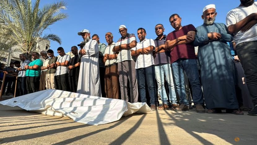 Israel sends scores of bodies to Gaza; Palestinians demand details before burying them Israel sends scores of bodies to Gaza; Palestinians demand details before burying them