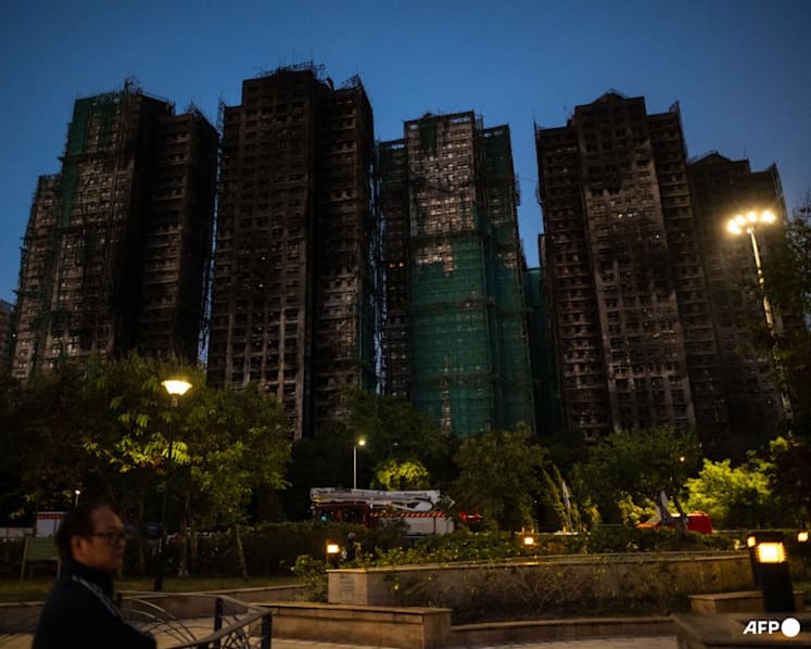 Hong Kong tower fire toll rises to 128, more arrests made