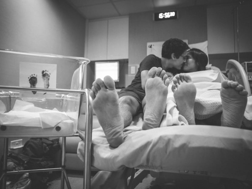 The author took this photo of a couple holding their stillborn baby in a Singapore hospital in 2019. The author took this photo of a couple holding their stillborn baby in a Singapore hospital in 2019.