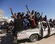 Some Palestinians pack up and move toward their homes in Gaza after ceasefire