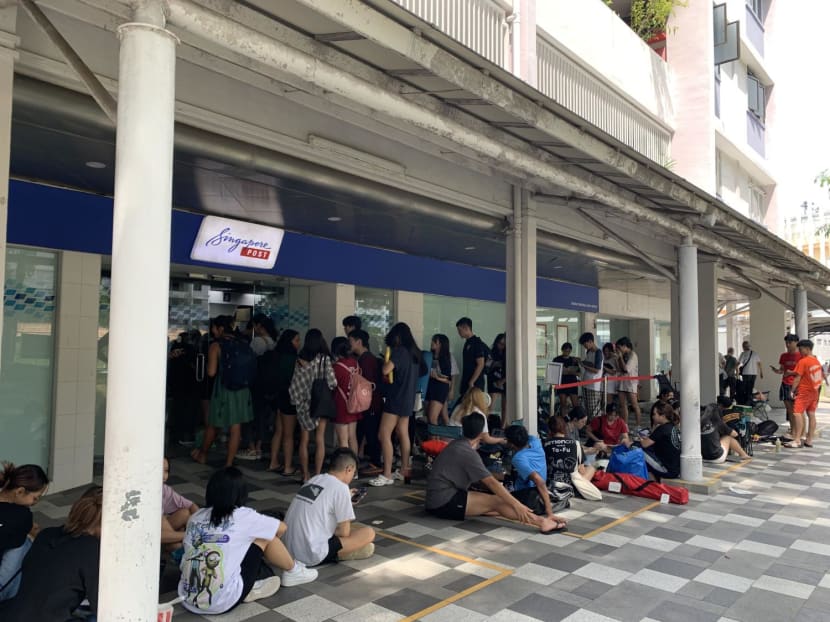 The queue at SingPost's Bedok Central outlet at 12pm on July 7, 2023.