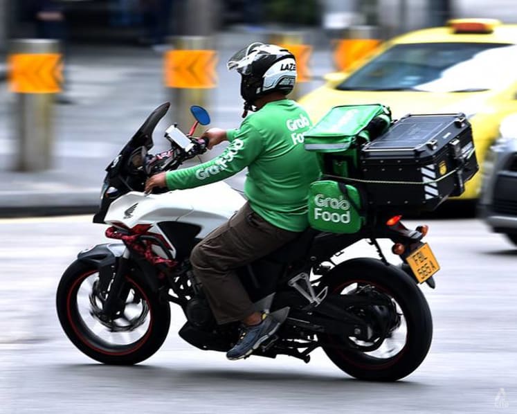 Commentary: Wheels of change turning on relationship between delivery workers and platforms