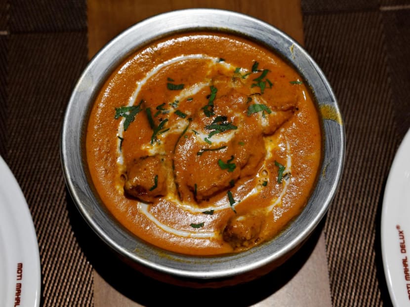 A freshly prepared butter chicken dish is placed on a table inside the Moti Mahal Delux restaurant in New Delhi, India on Jan 23, 2024.