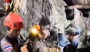 Rescuers pull out first survivor from flooded Laos cave