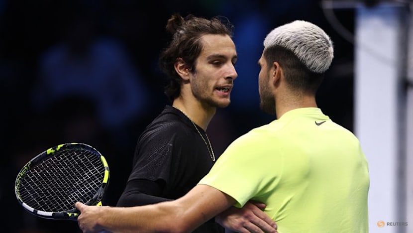 Alcaraz clinches year-end top spot with ATP Finals win over Musetti