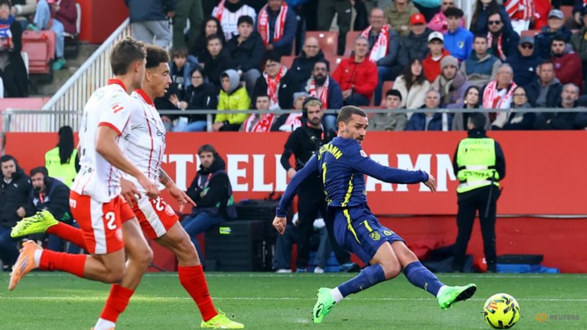 In-form Atletico ease to 3-0 victory at lowly Girona