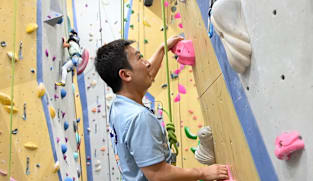 He's visually impaired but it has not stopped him from scaling rock walls