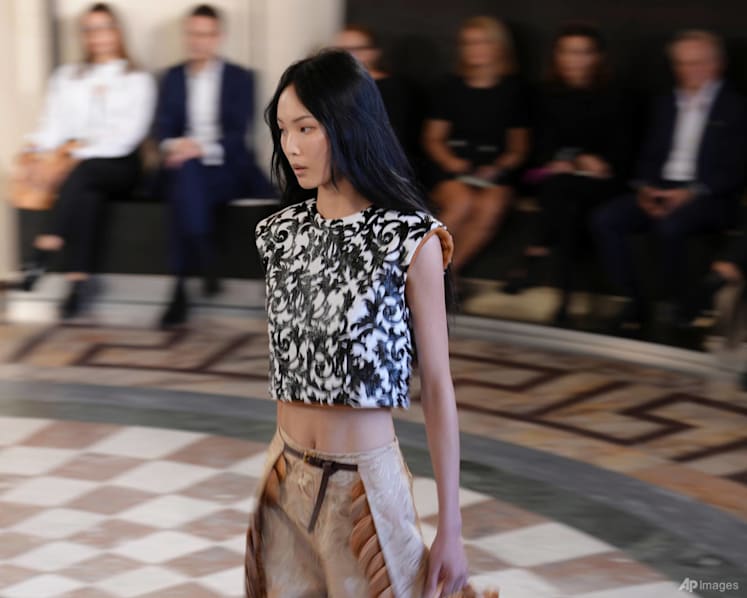 At Vuitton, the Louvre is a stage for stars, spectacle and Paris Fashion Week's moving masterpiece