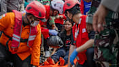 Bad weather hampers Indonesia ferry rescue, dozens still missing