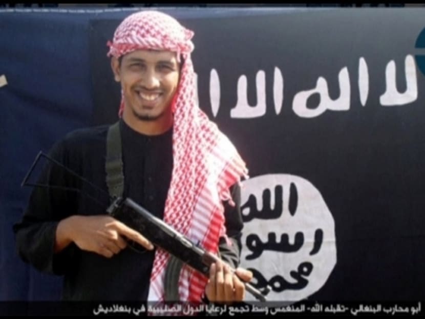 A still image taken from video shows an undated photo of Nibras Islam with a gun. Photo: REUTERS