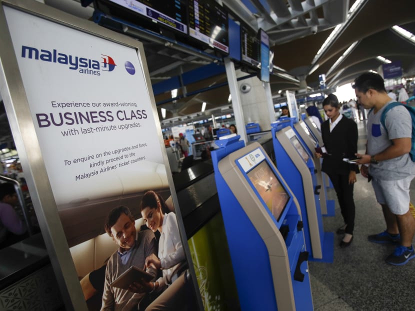 Malaysians who discredit or ridicule the Government can be barred from travelling overseas for three years, according to a report by The Star newspaper. Photo: AP