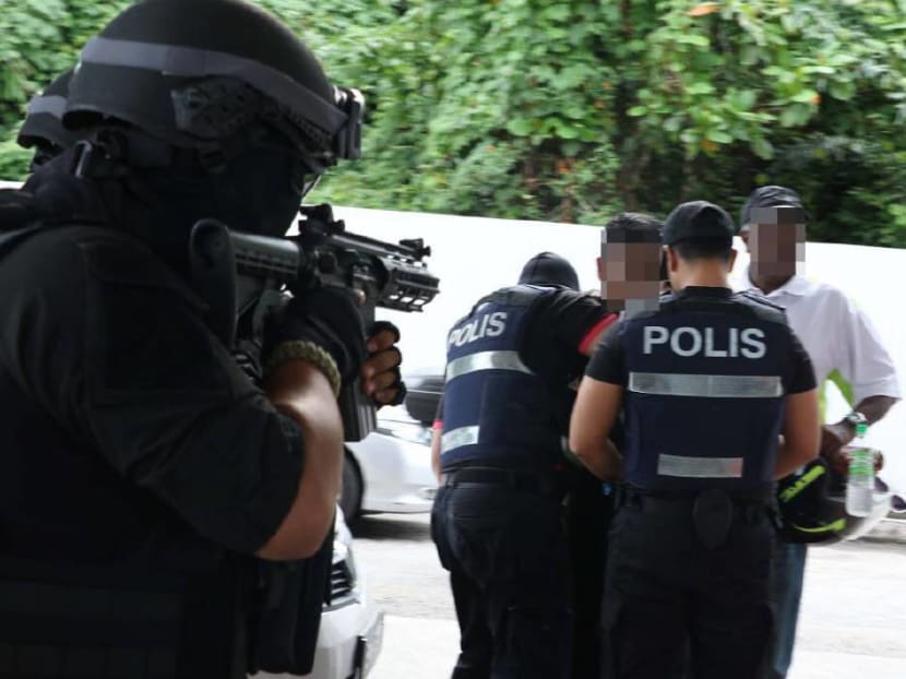 Six individuals, including two women, were arrested in five states earlier this year over suspected ties to the Islamic State (IS). Photo: Malaysia police via New Straits Times