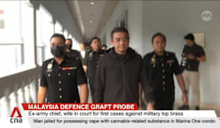Malaysia’s former army chief, wife charged with money laundering