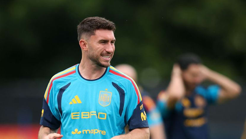 Unbeaten Spain ready for whatever Uruguay throw at them, Laporte says