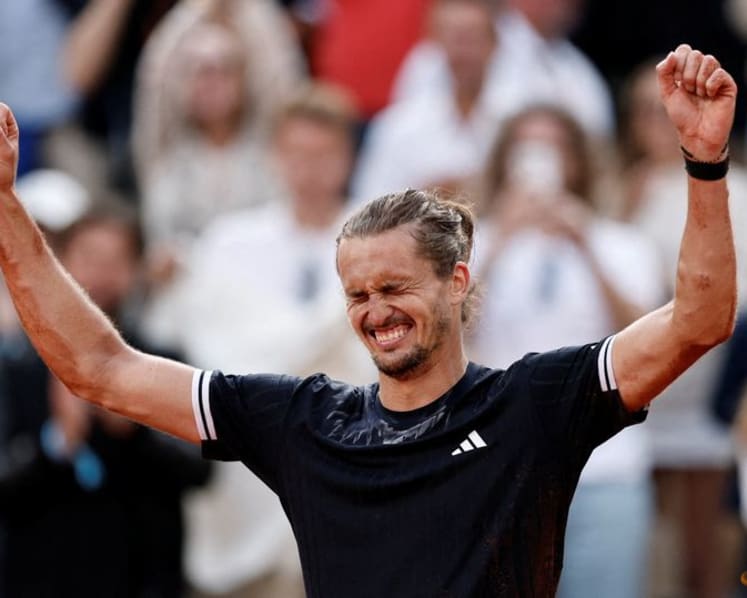 Zverev tears down the wall to enter Grand Slam winners' circle at French Open